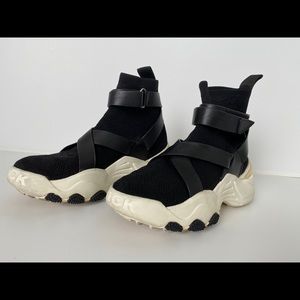 The Kooples x Slick Woods Used high-top trainers.